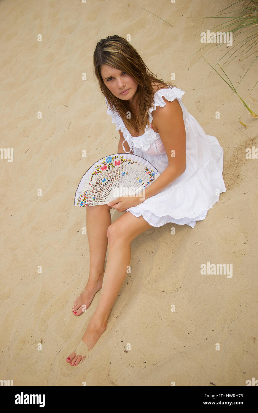 Woman in white dress beach hires stock photography and images Alamy — free download
