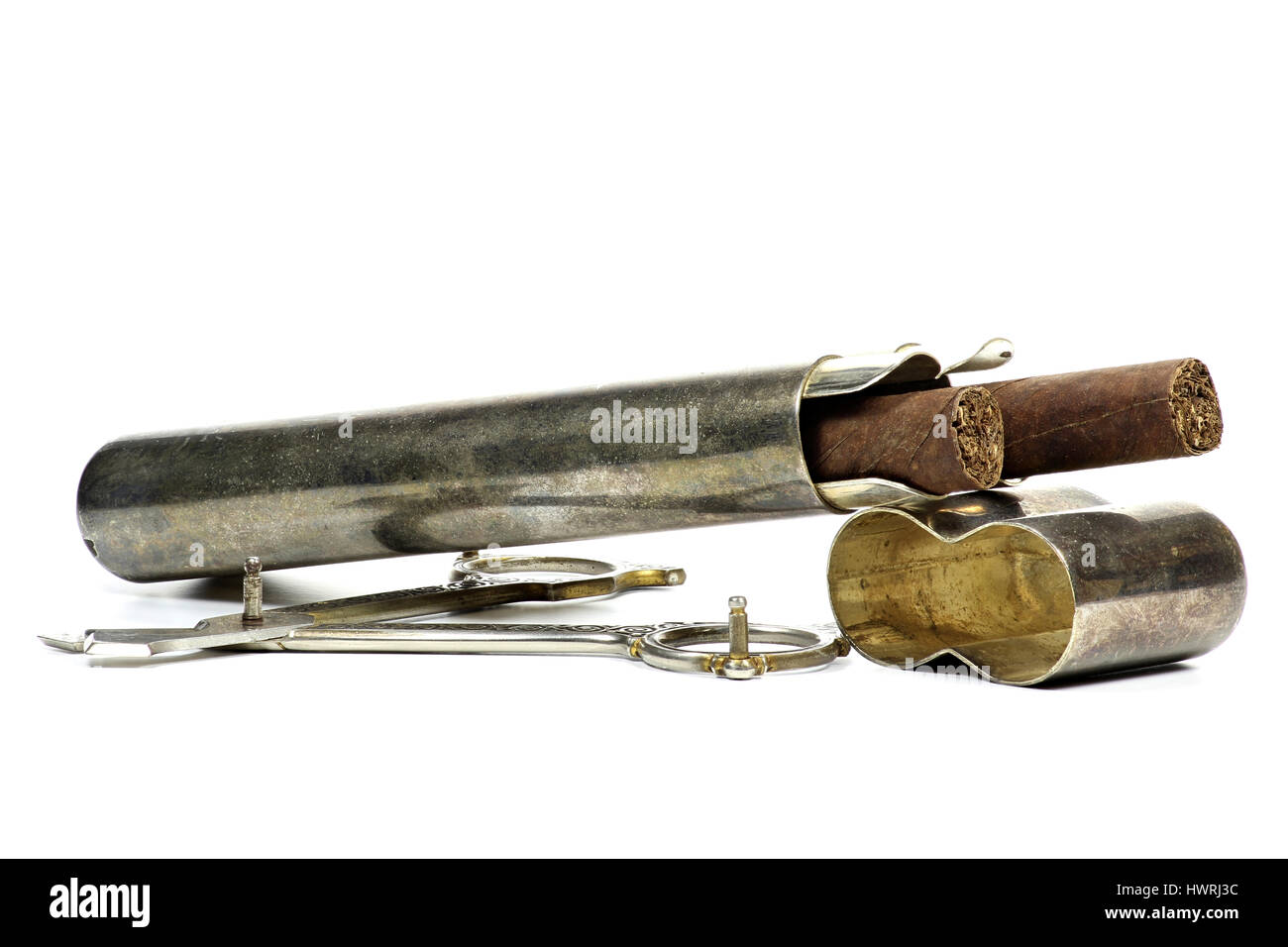 cigars in silver case with scissors isolated on white background Stock Photo