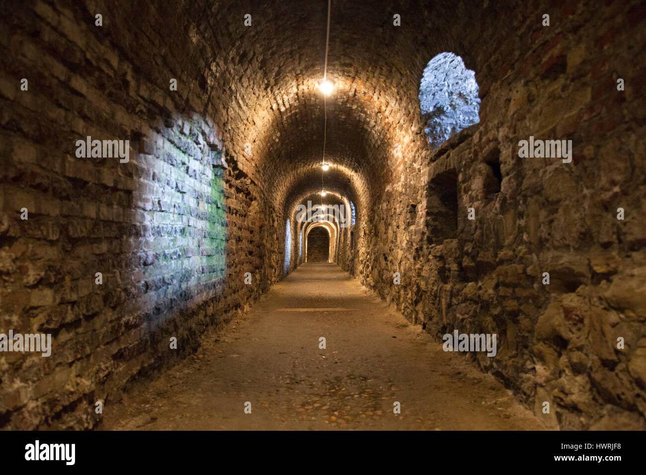 Background of the tunnel from stone and brick walls texture Stock Photo