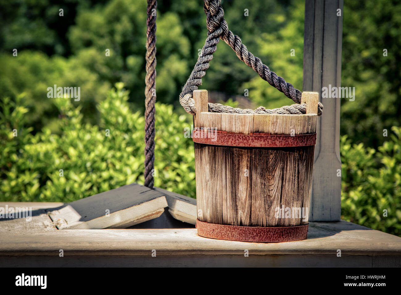 A water bucket sits on a well in rural Virginia. Stock Photo