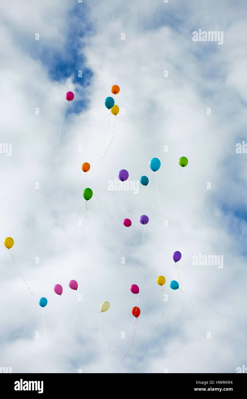 Many color ballons flying up in to the sky Stock Photo