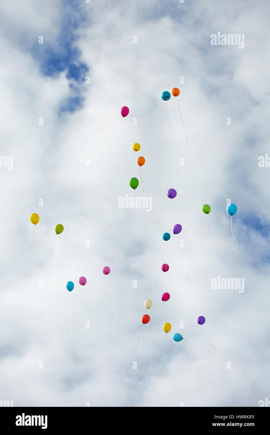 Many color ballons flying up in to the sky Stock Photo