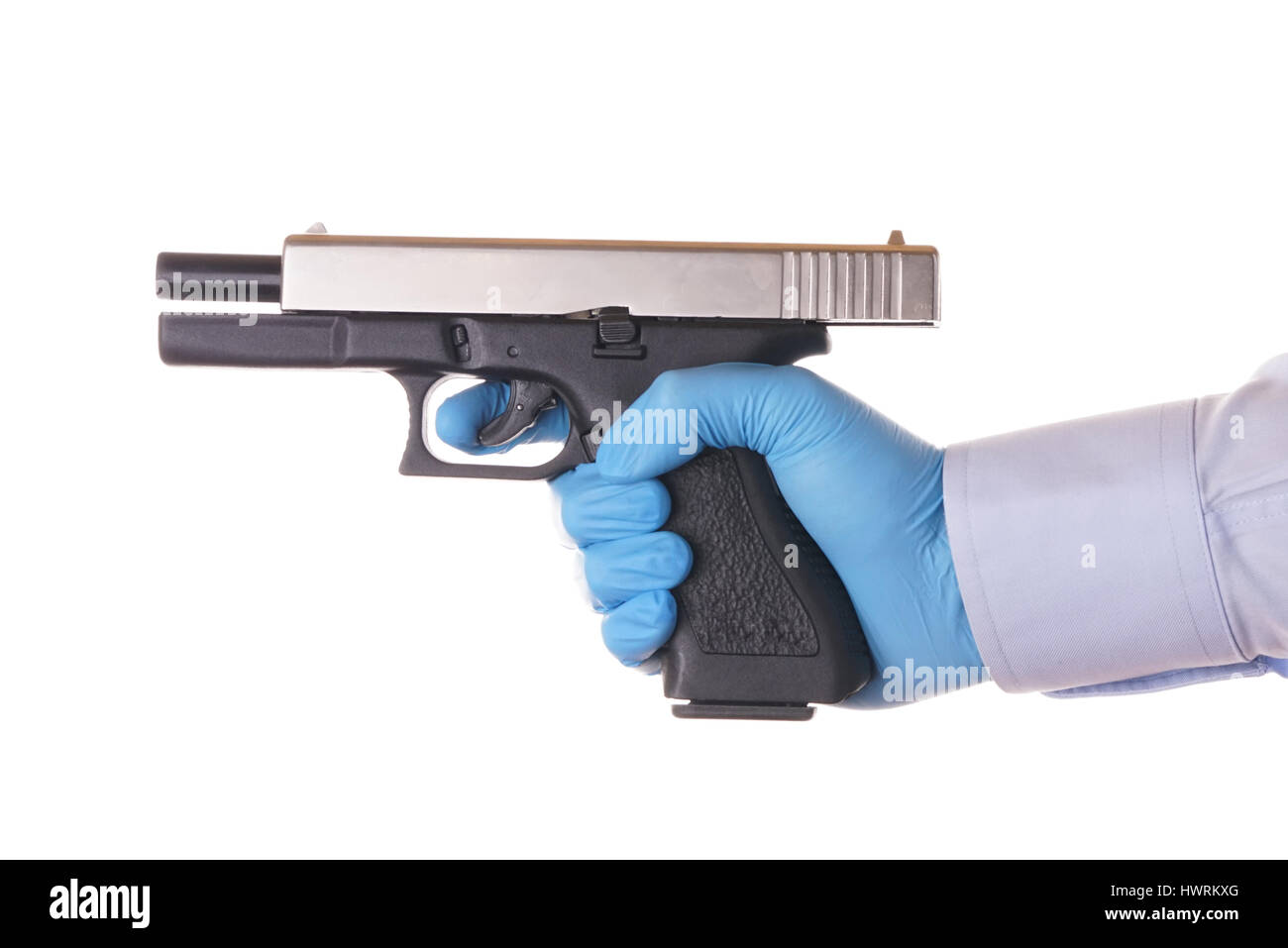 Stock Photo - Hand holding gun isolated on white, blue nitrile glove Stock Photo