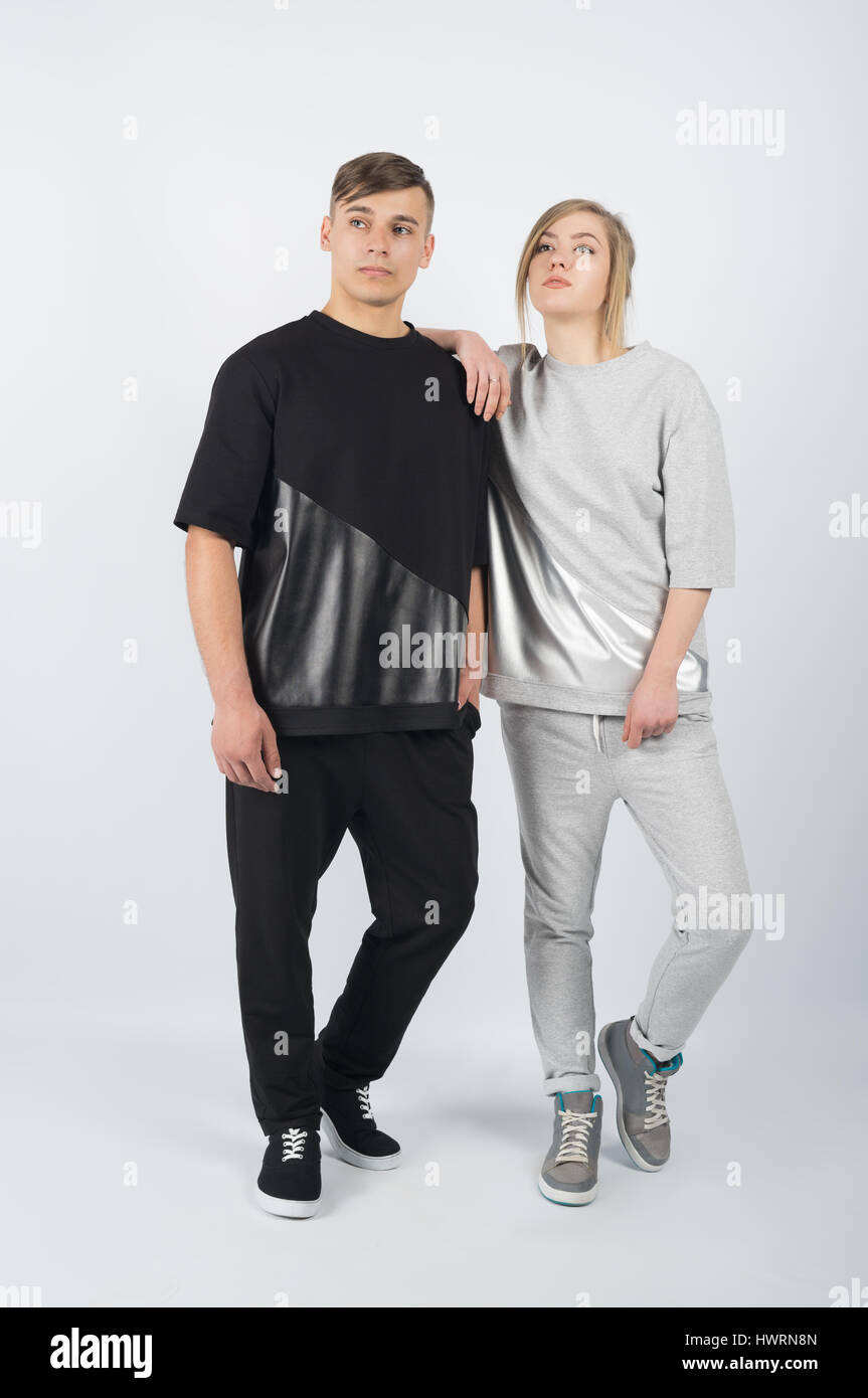 Fashion Girl Leans On Boy S Shoulder Young Muscular Man Wearing Stock Photo Alamy