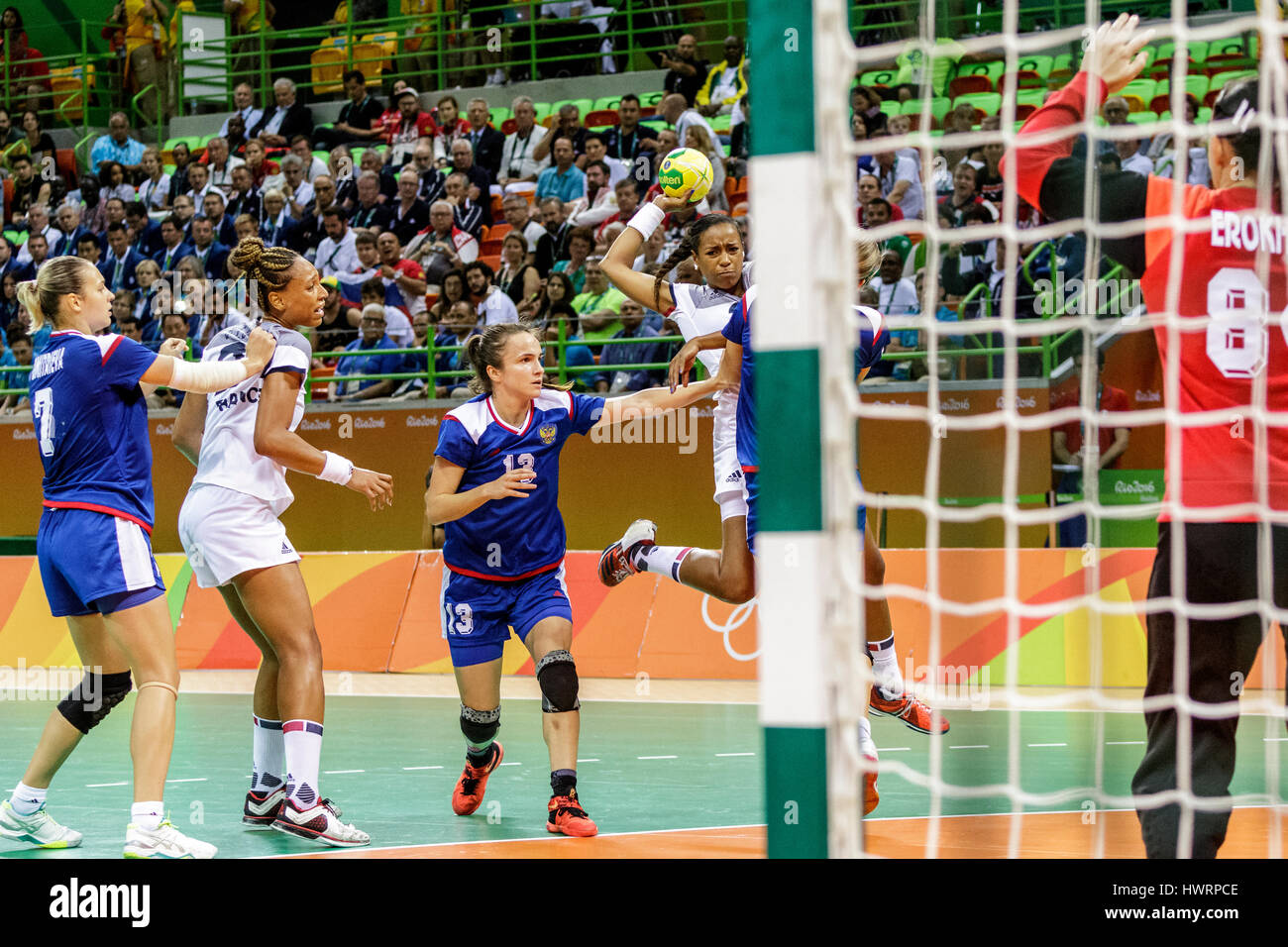 Rio de Janeiro, Brazil. 20 August 2016  Estelle Nze Minko (FRA) #27 shooting and Anna Vyakhireva (RUS) #13 compete in the women's handball gold medal  Stock Photo