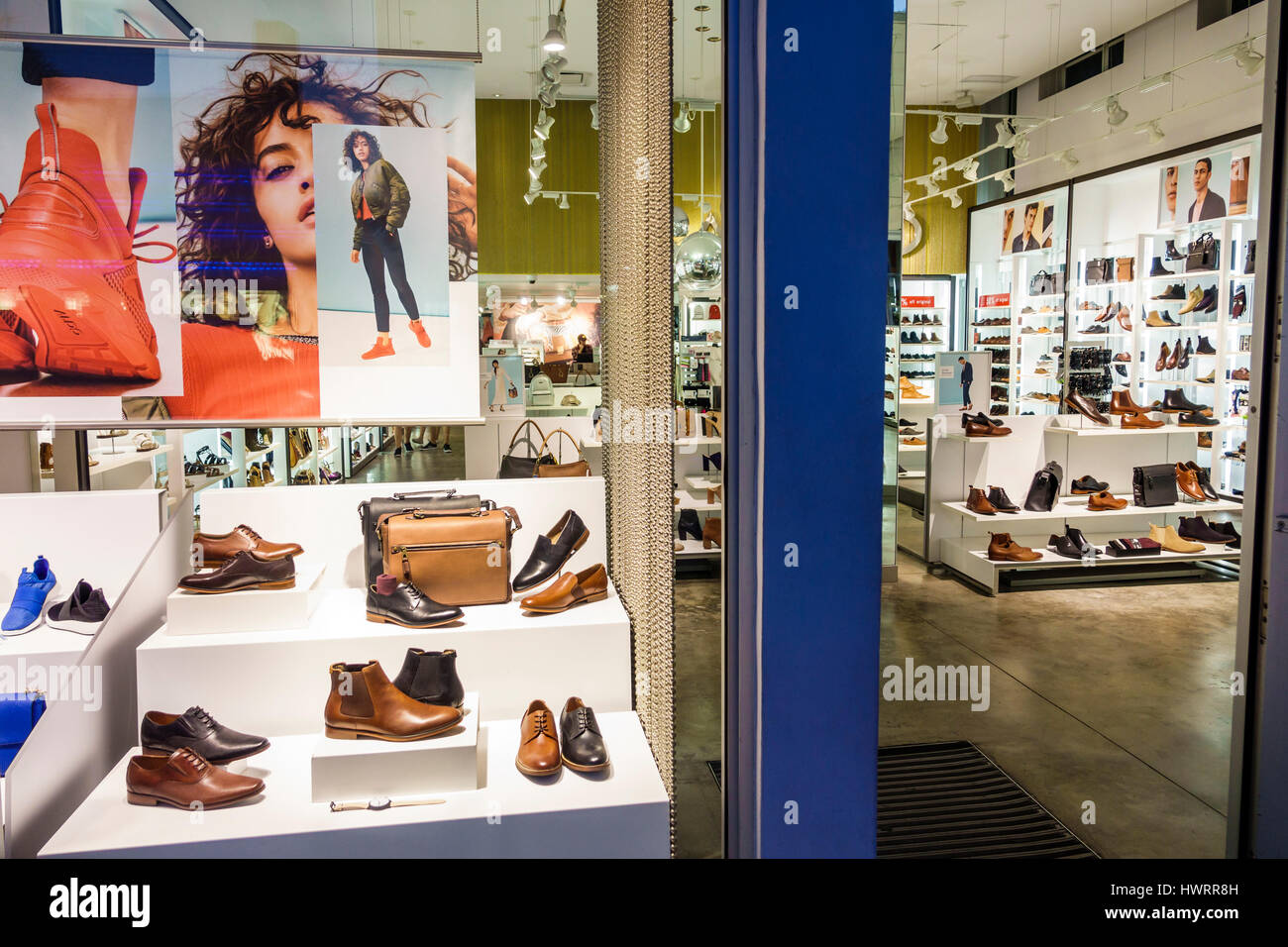 Miami Beach Florida,Collins Shoes footwear,shopping shoe store business men's shoes window display entrance Stock Photo - Alamy