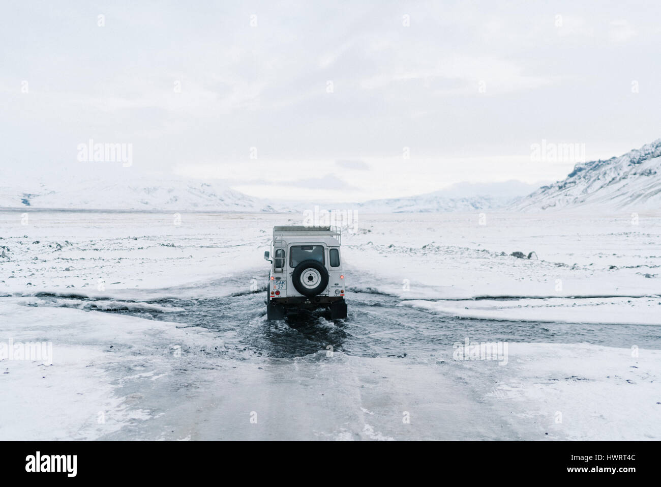 Land Rover driving off road through rugged Icelandic landscape Stock ...
