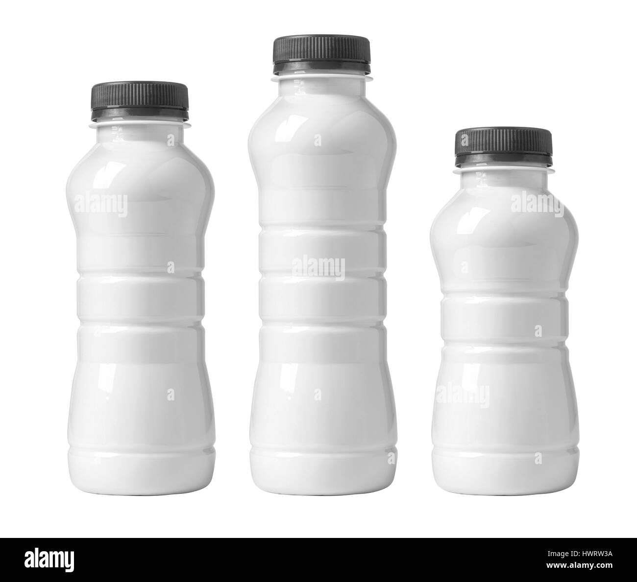 three white plastic bottle isolated on white background Stock Photo - Alamy