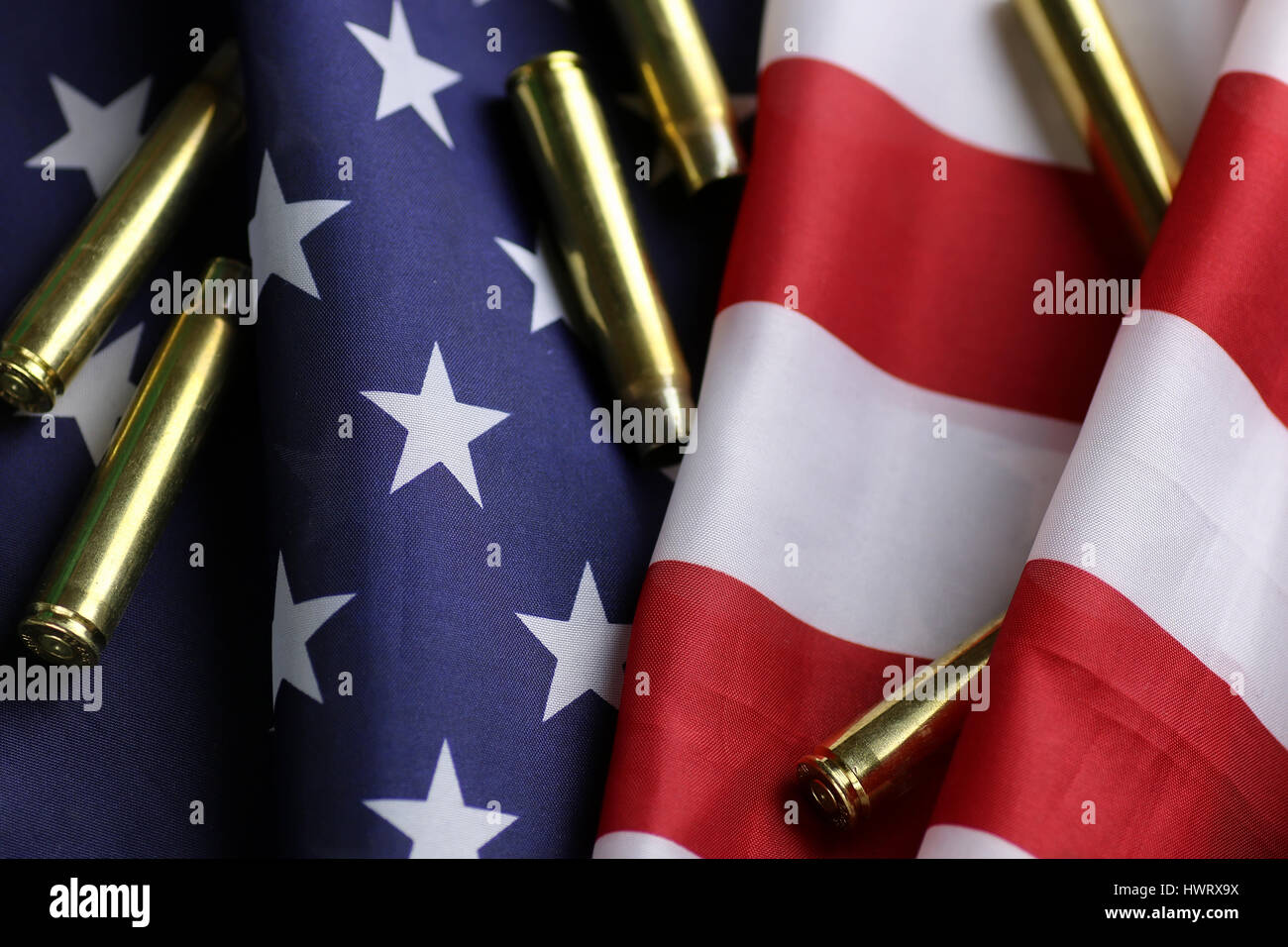 bullet on the USA flag Stock Photo - Alamy