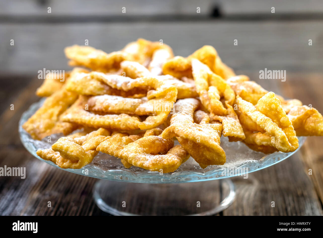 Flancat crisp deep fried pastry dusted with powdered sugar Stock Photo