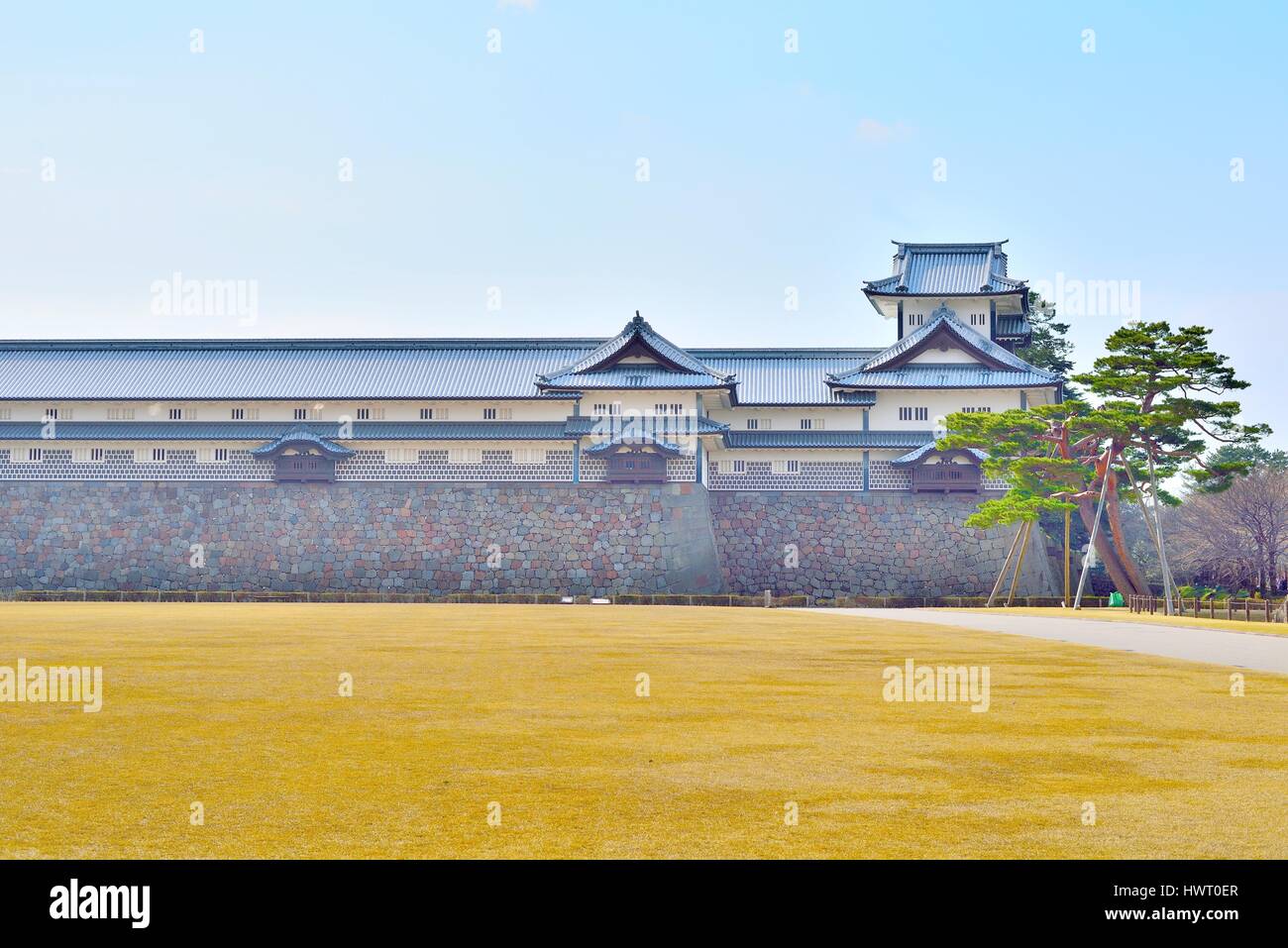 Kanazawa castle walls, tower and pine tree in Ishikawa, Japan Stock Photo