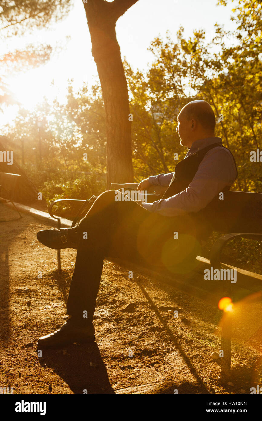 Man bench sitting park hi-res stock photography and images - Alamy