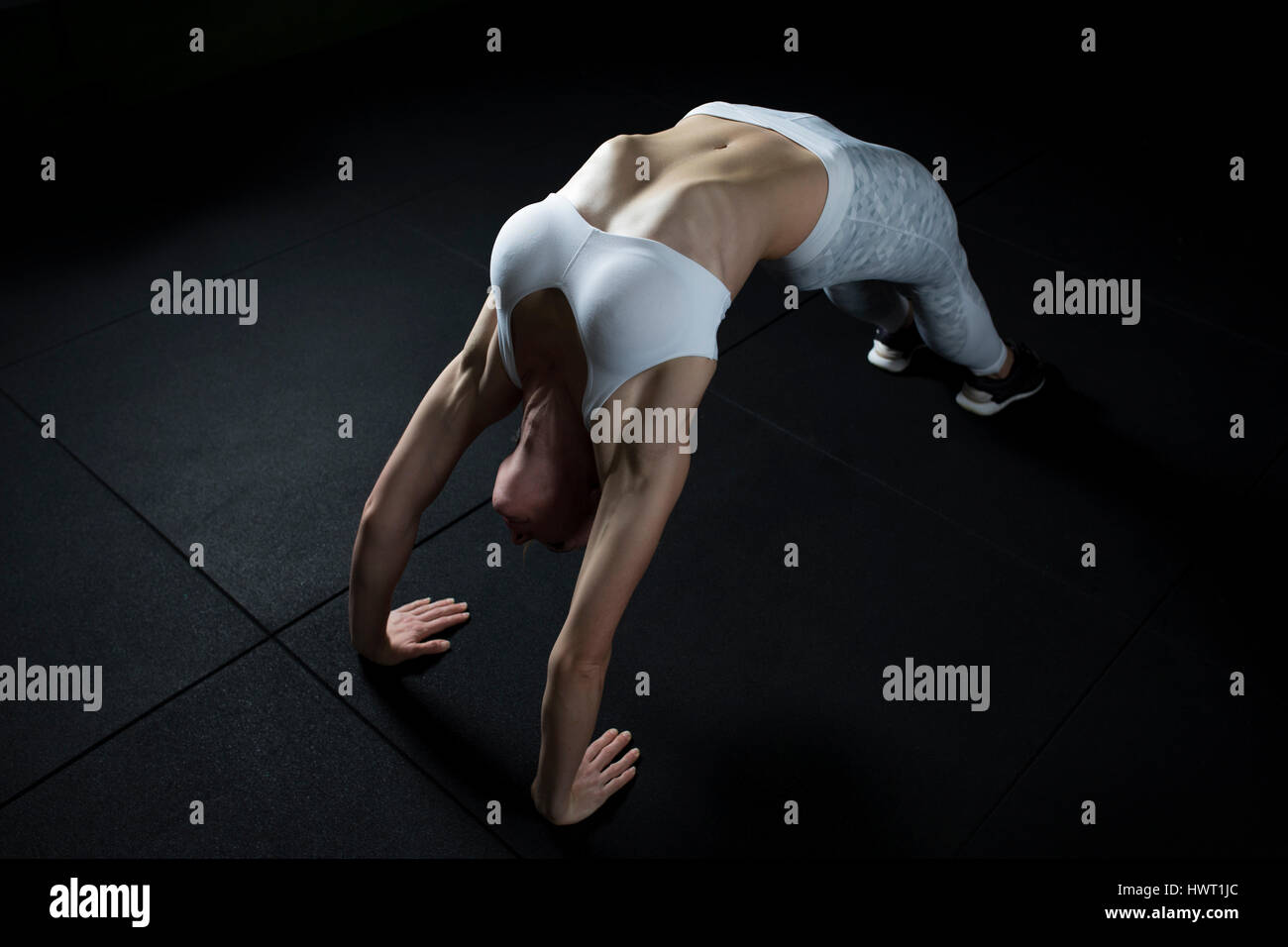 High angle view of woman exercising in gym Stock Photo