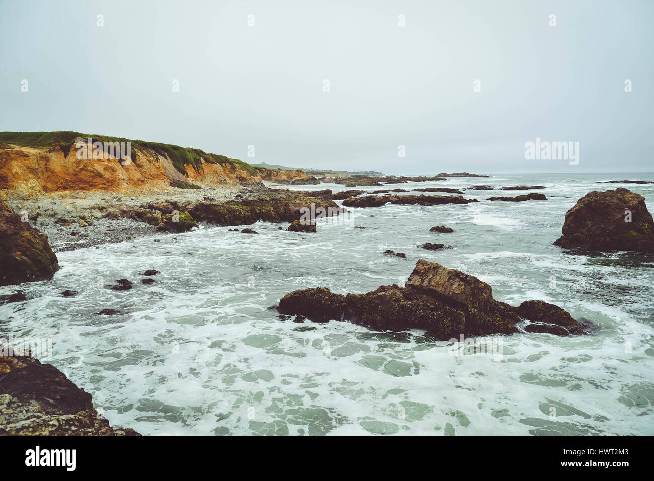 Scenic view of Pescadero State Beach against sky Stock Photo