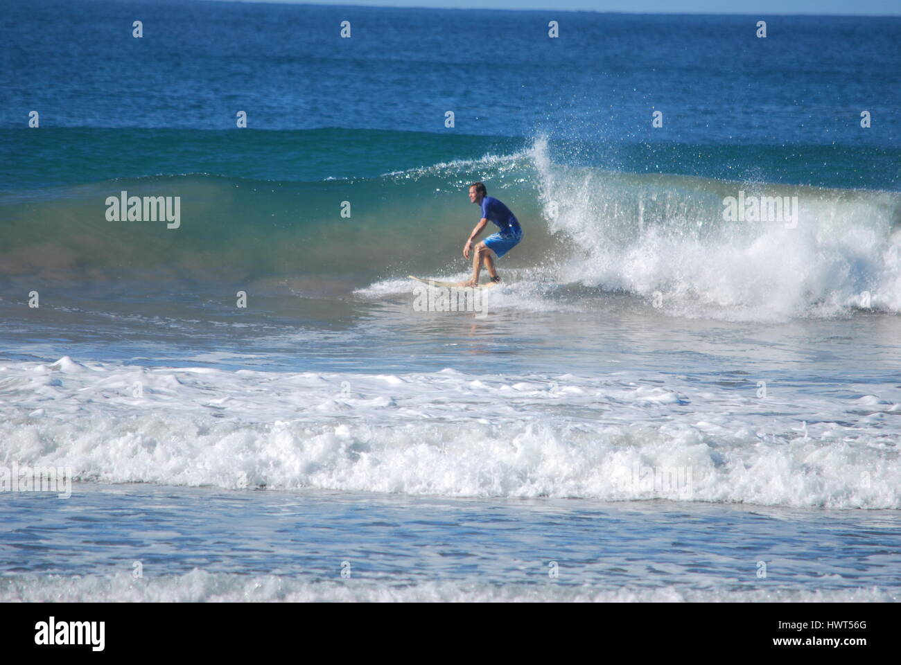 Surfing at Mal Pais,Costa Rica Stock Photo