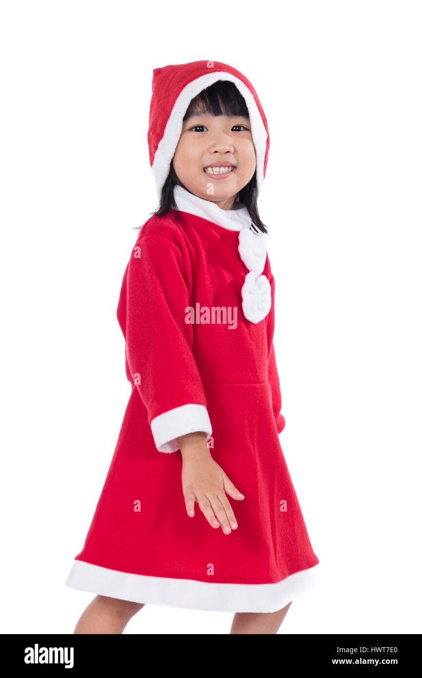 Happy Asian Chinese little santa claus girl posing in isolated white ...