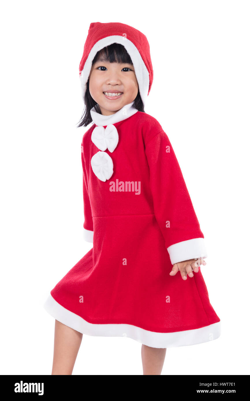 Happy Asian Chinese little santa claus girl posing in isolated white ...