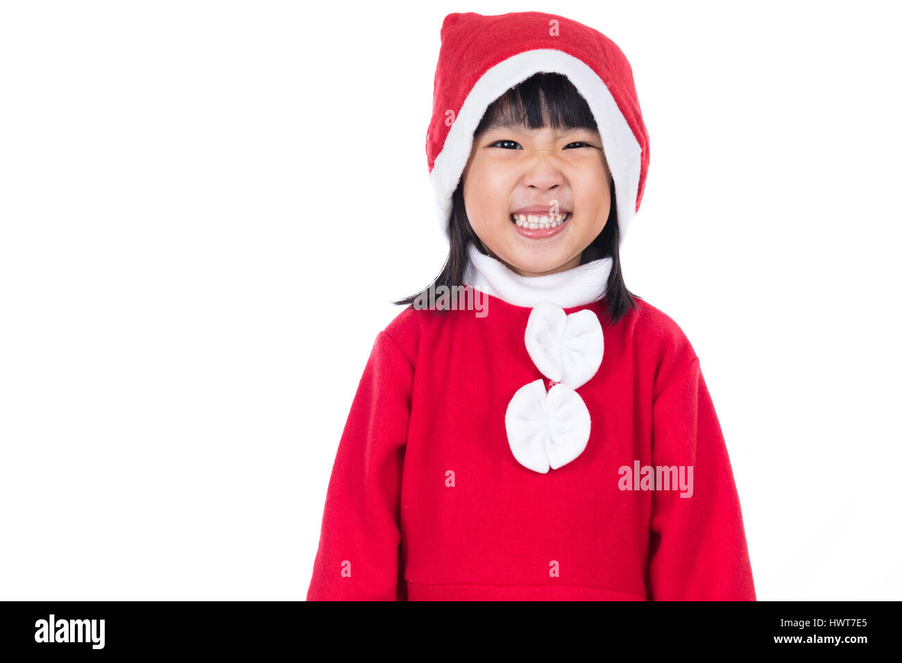 Happy Asian Chinese little santa claus girl posing in isolated white ...