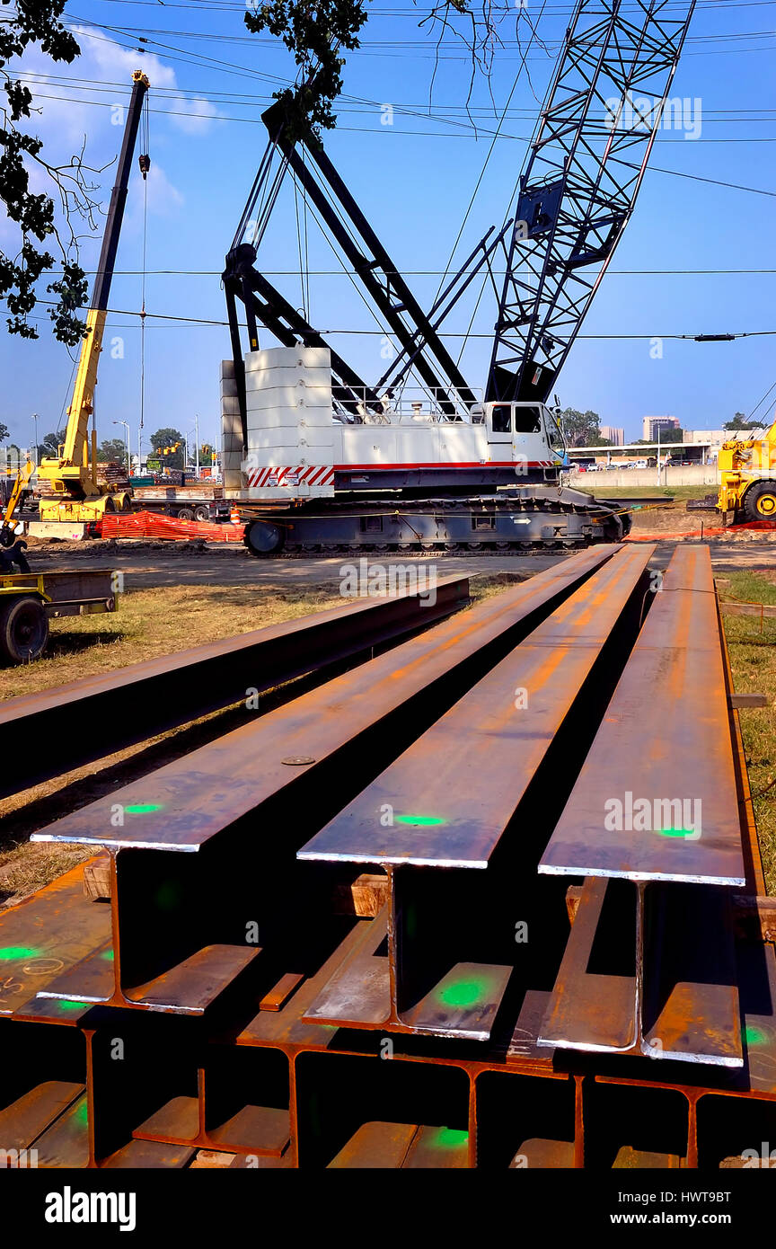 Crane and steel beams on job site Stock Photo