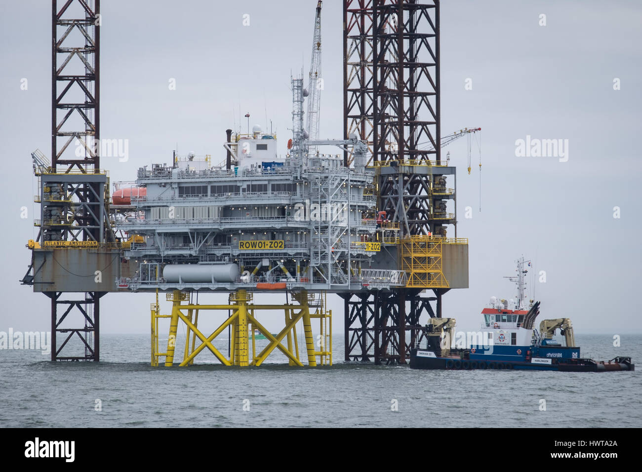 The Atlantic Amsterdam jacked up next to the first Race Bank Offshore Wind Farm (ROW01-Z02) substation during the 2017 construction phase. Stock Photo