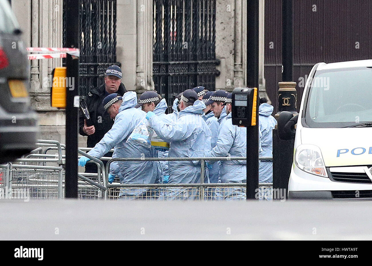 Police forensics at the gates of Houses of Parliament in London after ...