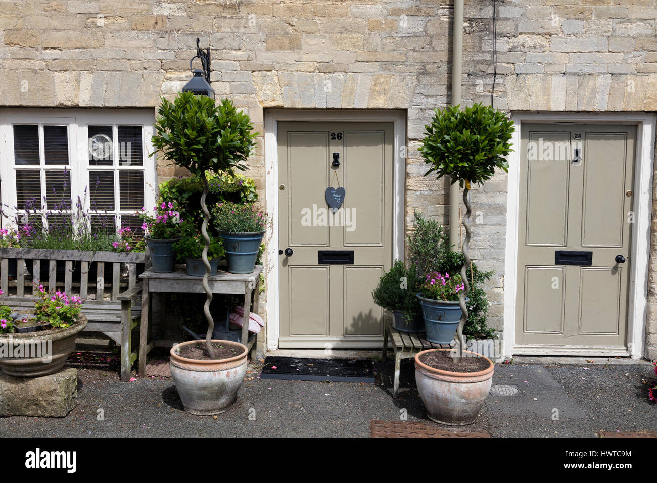 Study of doors on Cotswold stone terraced houses in Cecily Hill in Cirencester Stock Photo