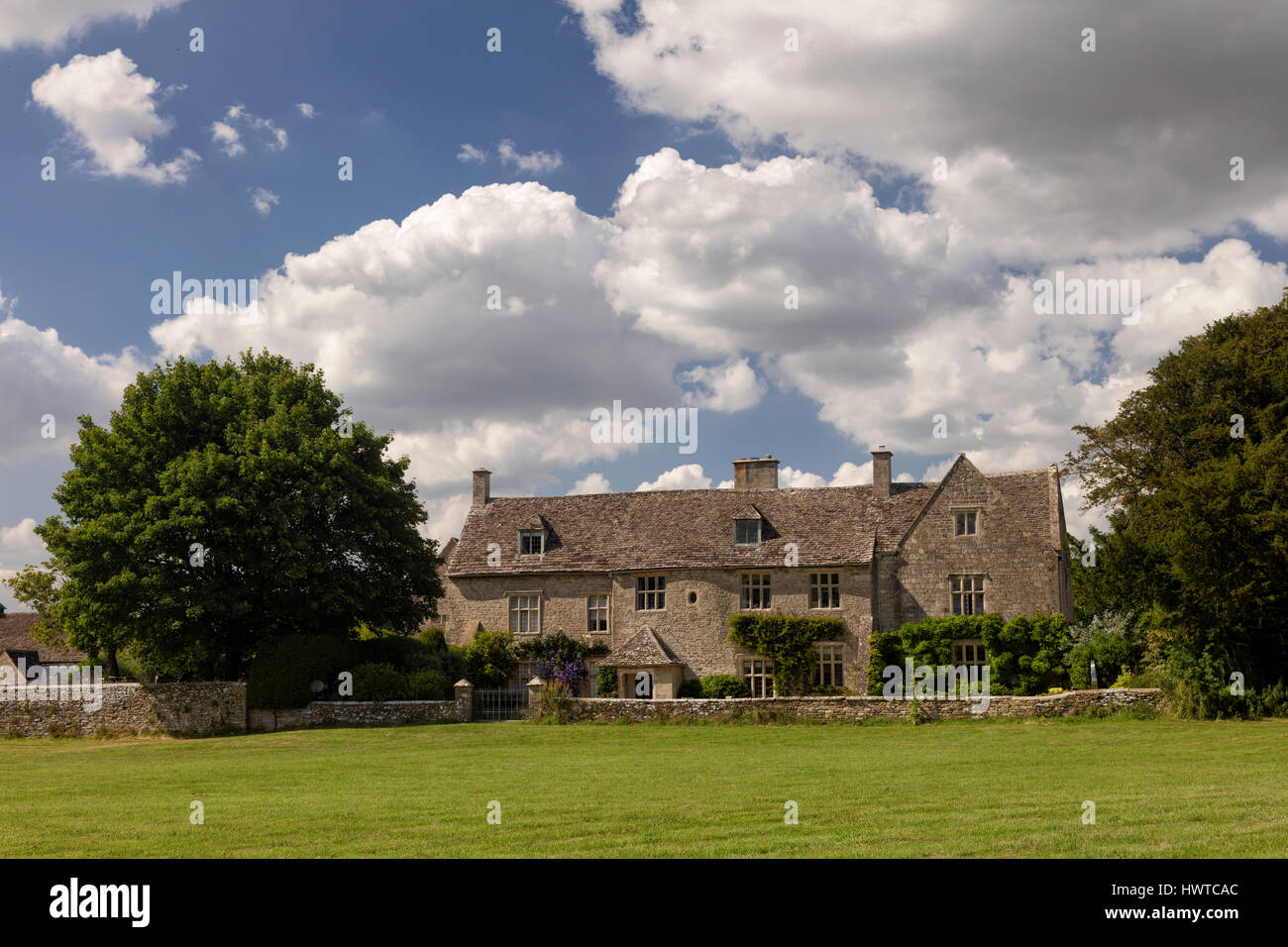Cotswold stone manor house in the Gloucestershire village of Somerford Keynes near Cirencester Stock Photo