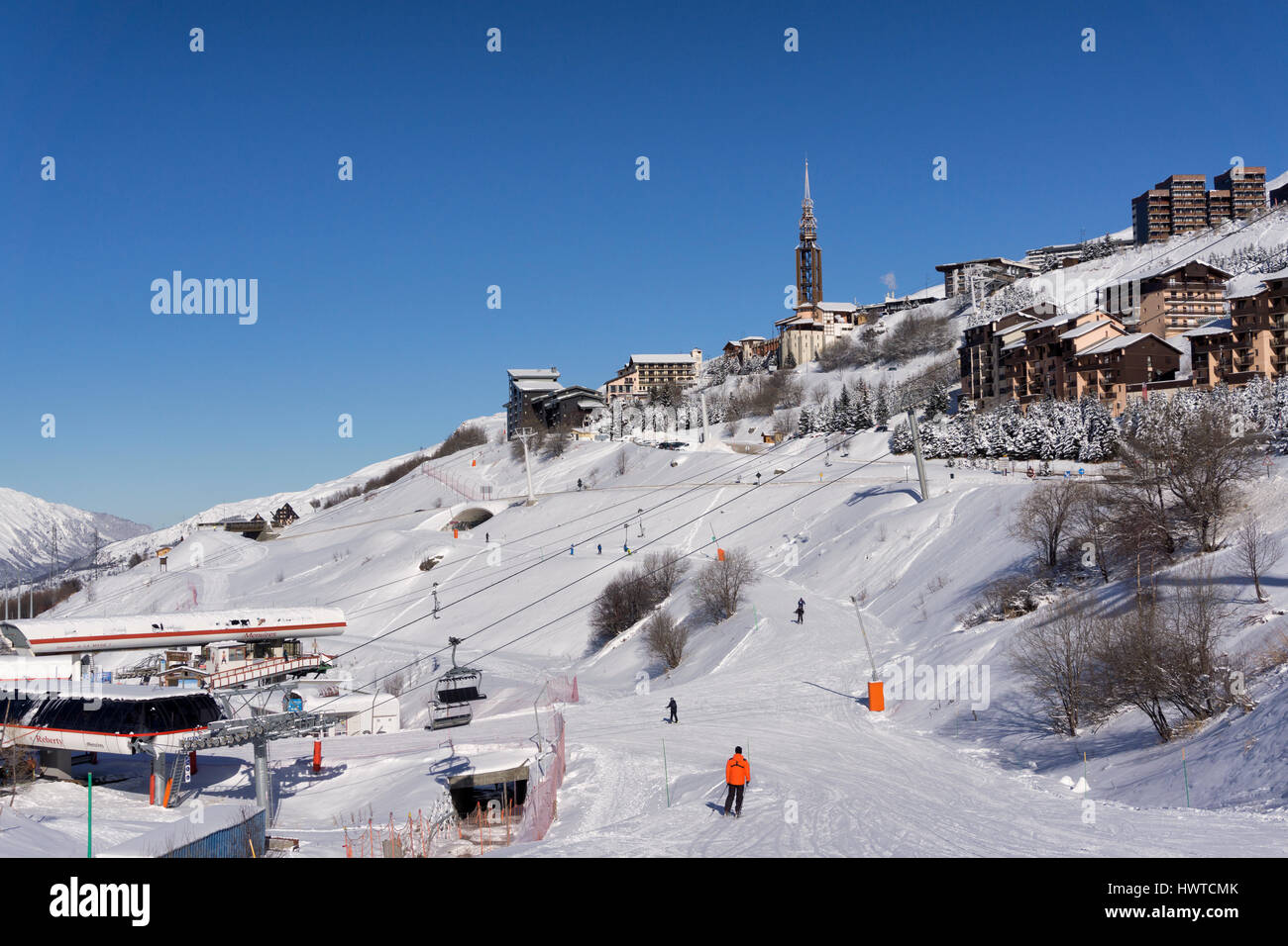 The french ski resort of Les Menuires with its modernist bell tower Stock Photo