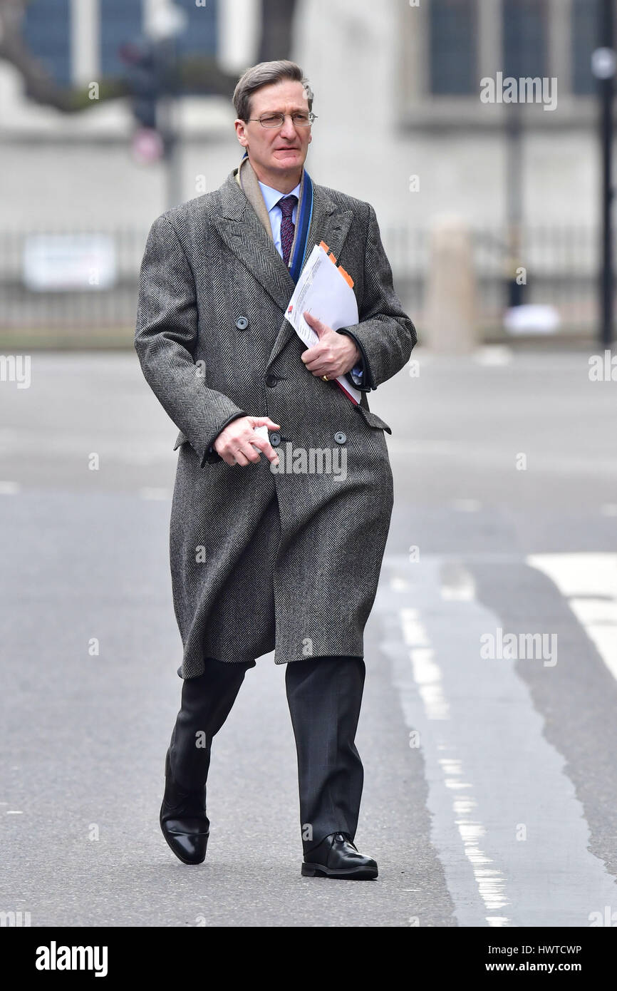Conservative MP Dominic Grieve walks along Whitehall near the Houses of Parliament in London, after seven people were arrested in raids in London, Birmingham and elsewhere linked to the Westminster terror attack. Stock Photo