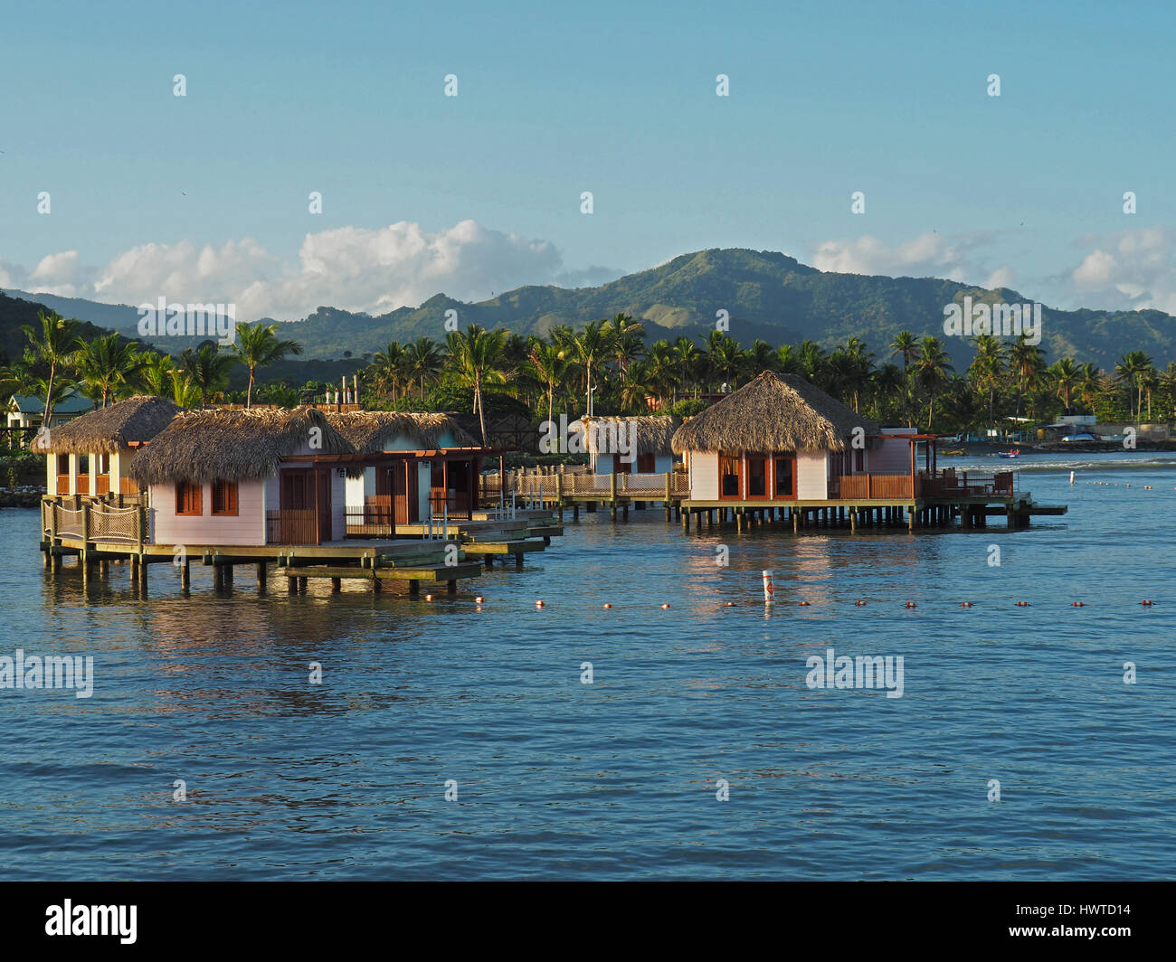 Overwater cabanas at Amber Cove Resort  on north shore of Dominican Republic near Puerto Plata. Stock Photo
