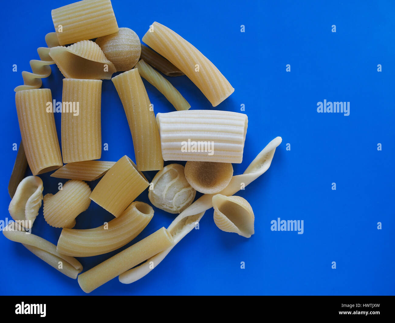 Many different types of Italian pasta including penne macaroni