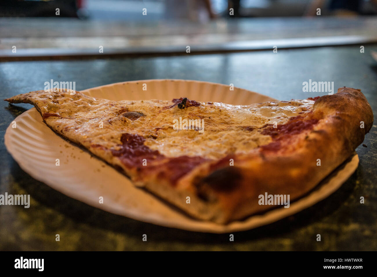 A beautiful slice of Pizza from Joe's, a well known joint in Manhattan. Stock Photo