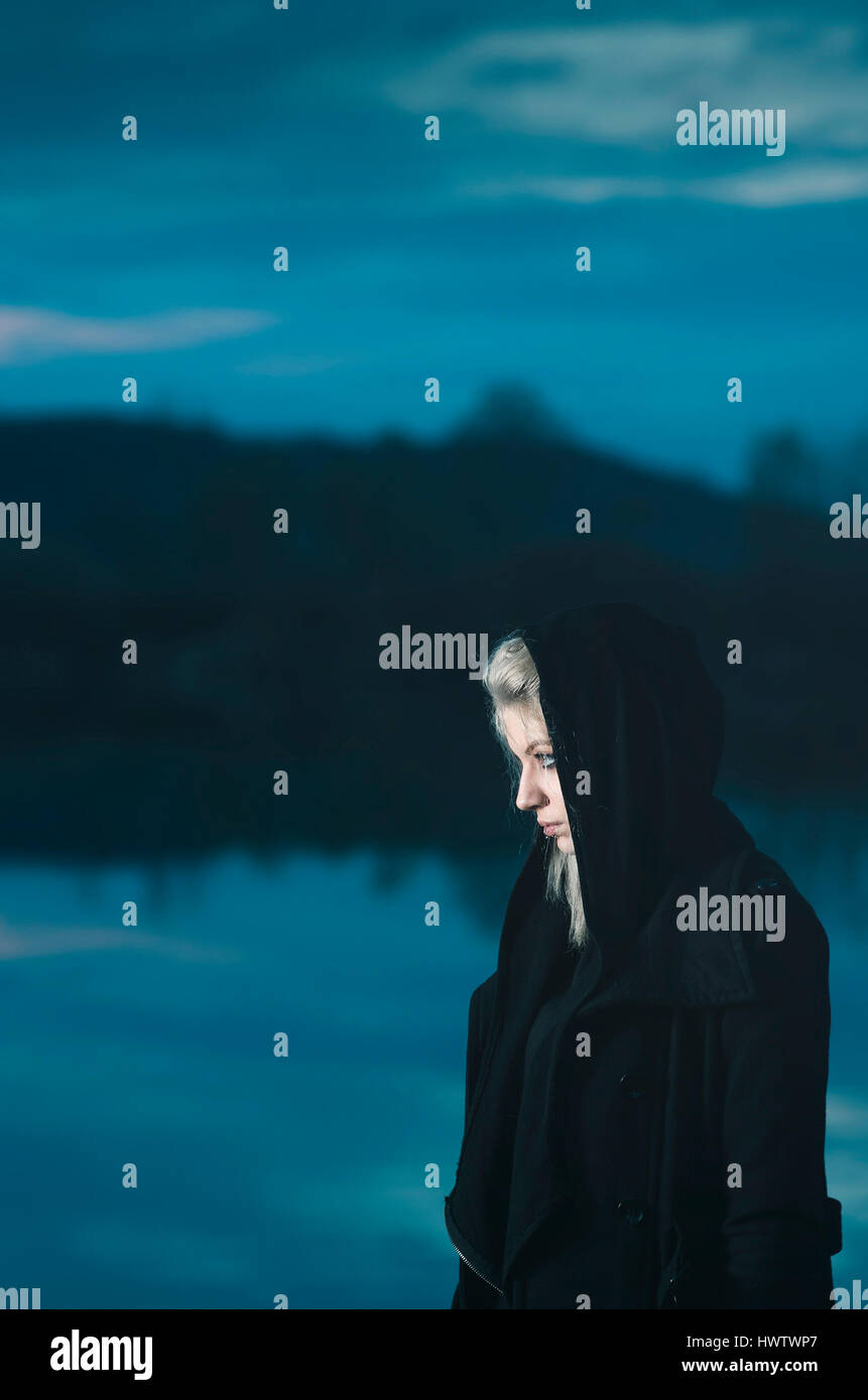 Wearing cloak and hood hi-res stock photography and images - Alamy