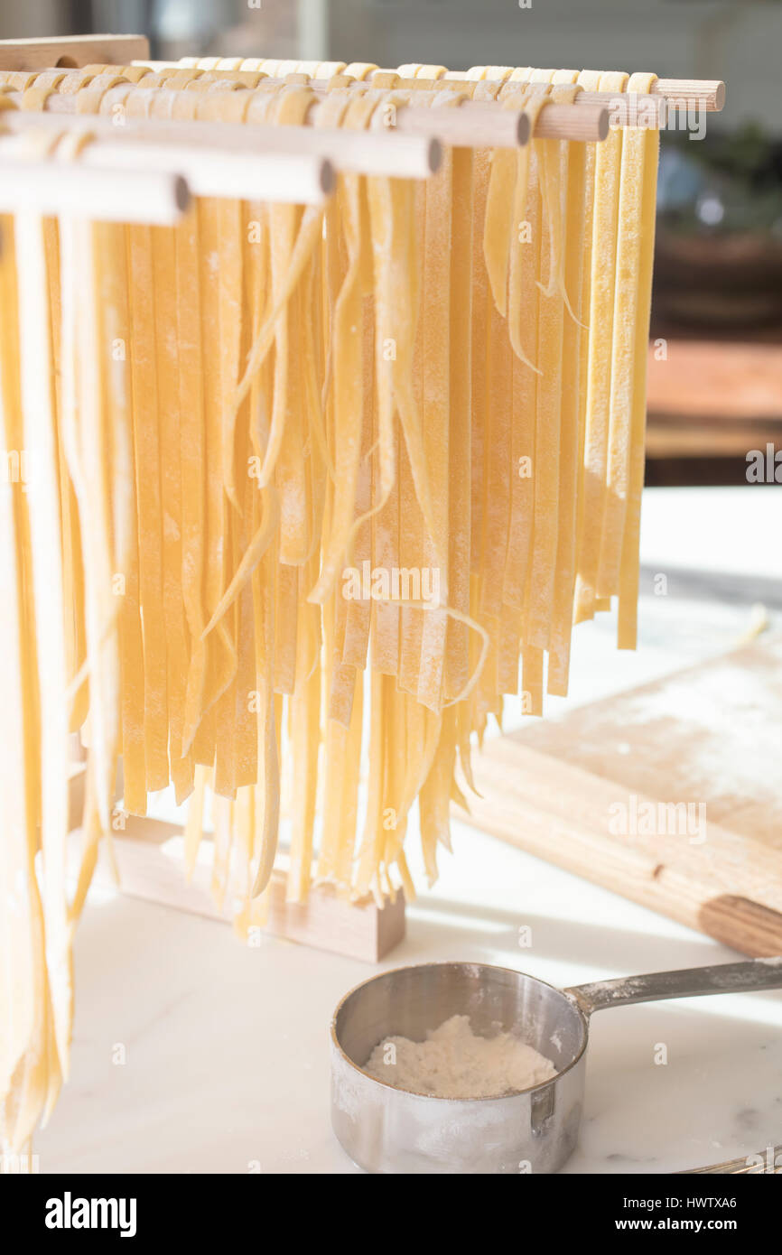 Homemade Spaghetti Drying on a Pasta Rack Stock Photo Alamy