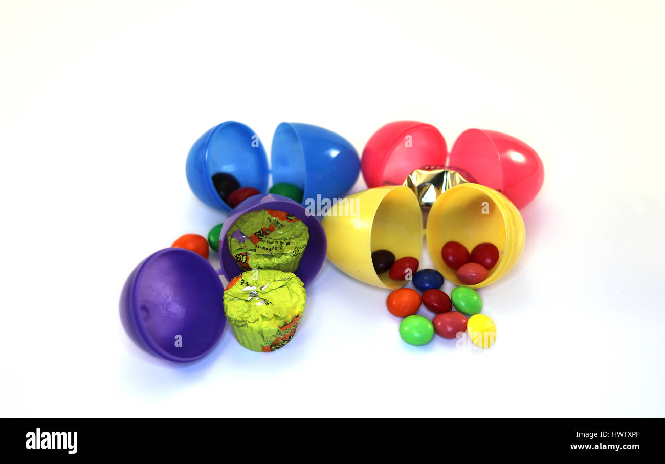 assorted colored easter eggs with cany inside Stock Photo Alamy