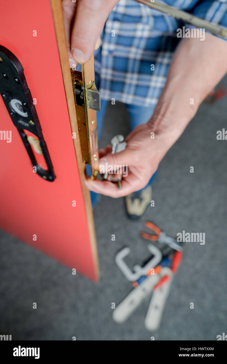 Replacing a door lock Stock Photo Alamy