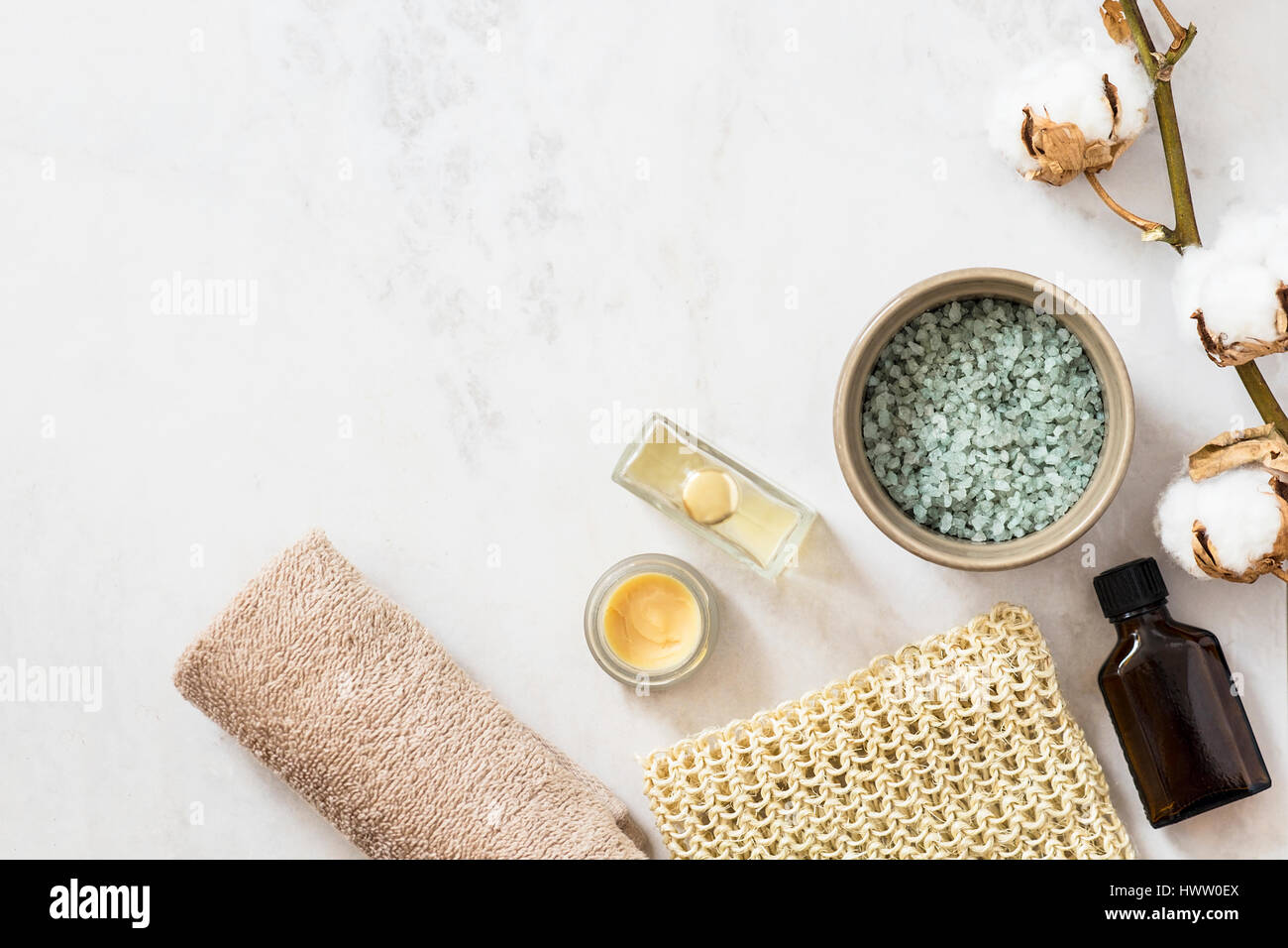 Spa beauty cosmetic products and tools on white marble background. Top view, copy space Stock Photo