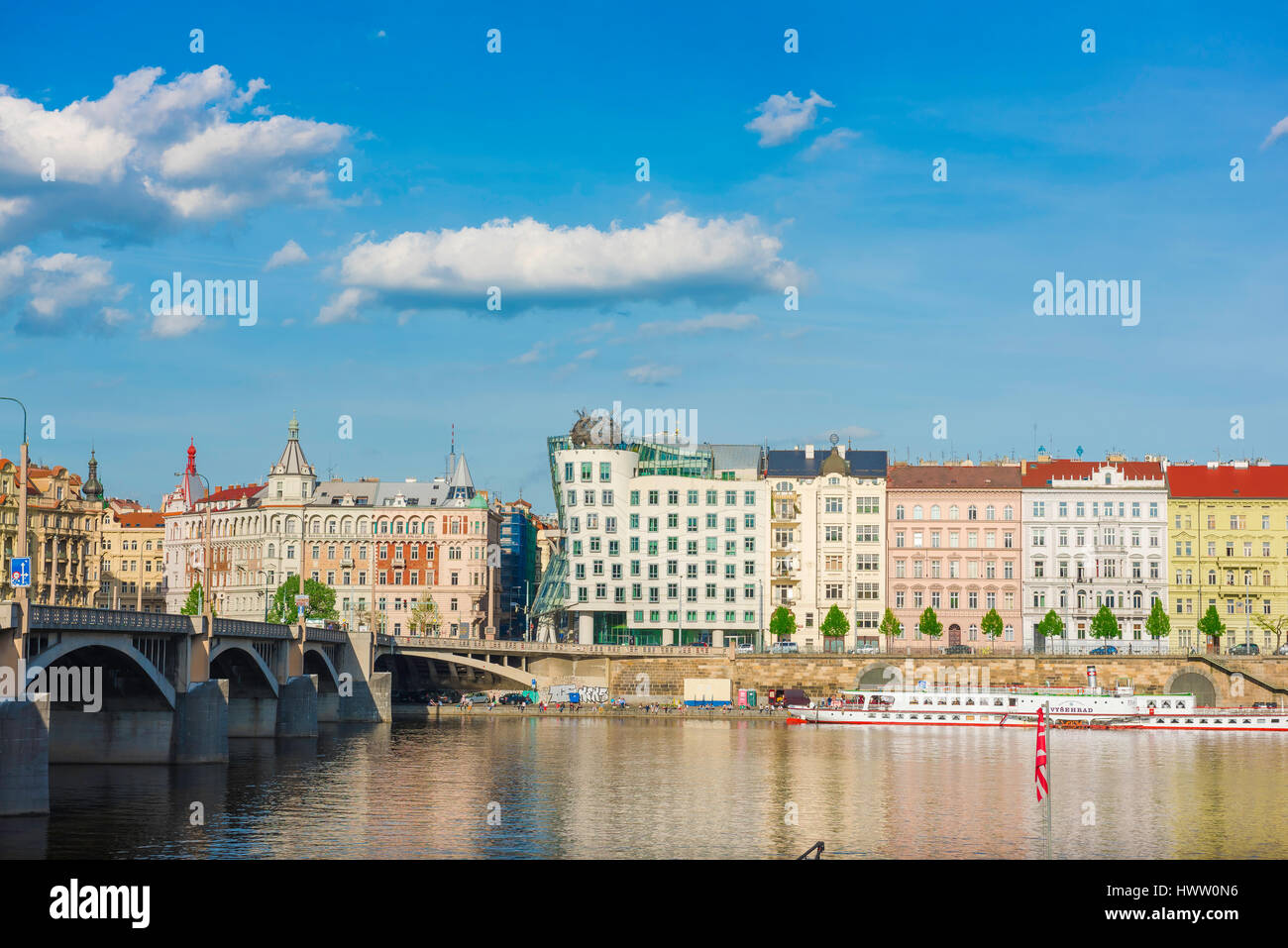 Prague river Vltava, view of buildings along the Nove Mesto side of the River Vltava in Prague, including the famous Dancing House (centre), Czech Rep Stock Photo