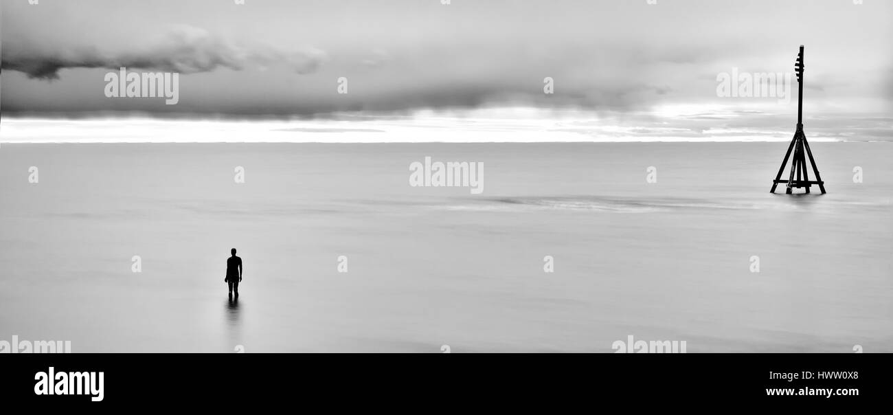 Long Exposure Minimalist Image of Antony Gormleys 'Another Place' Stock Photo