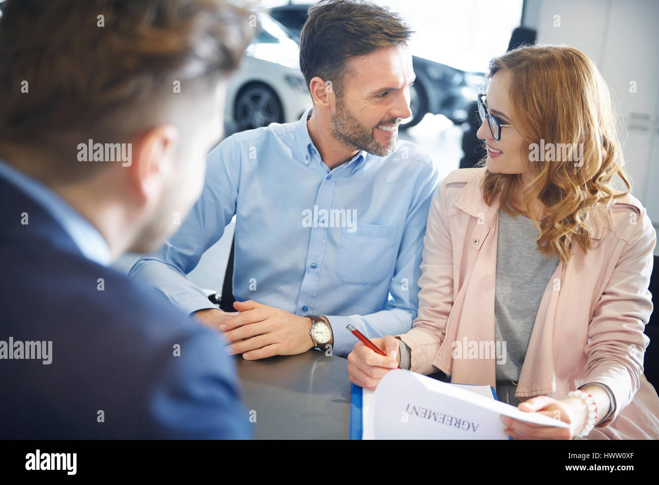 Car salesman sitting desk in hires stock photography and images Alamy