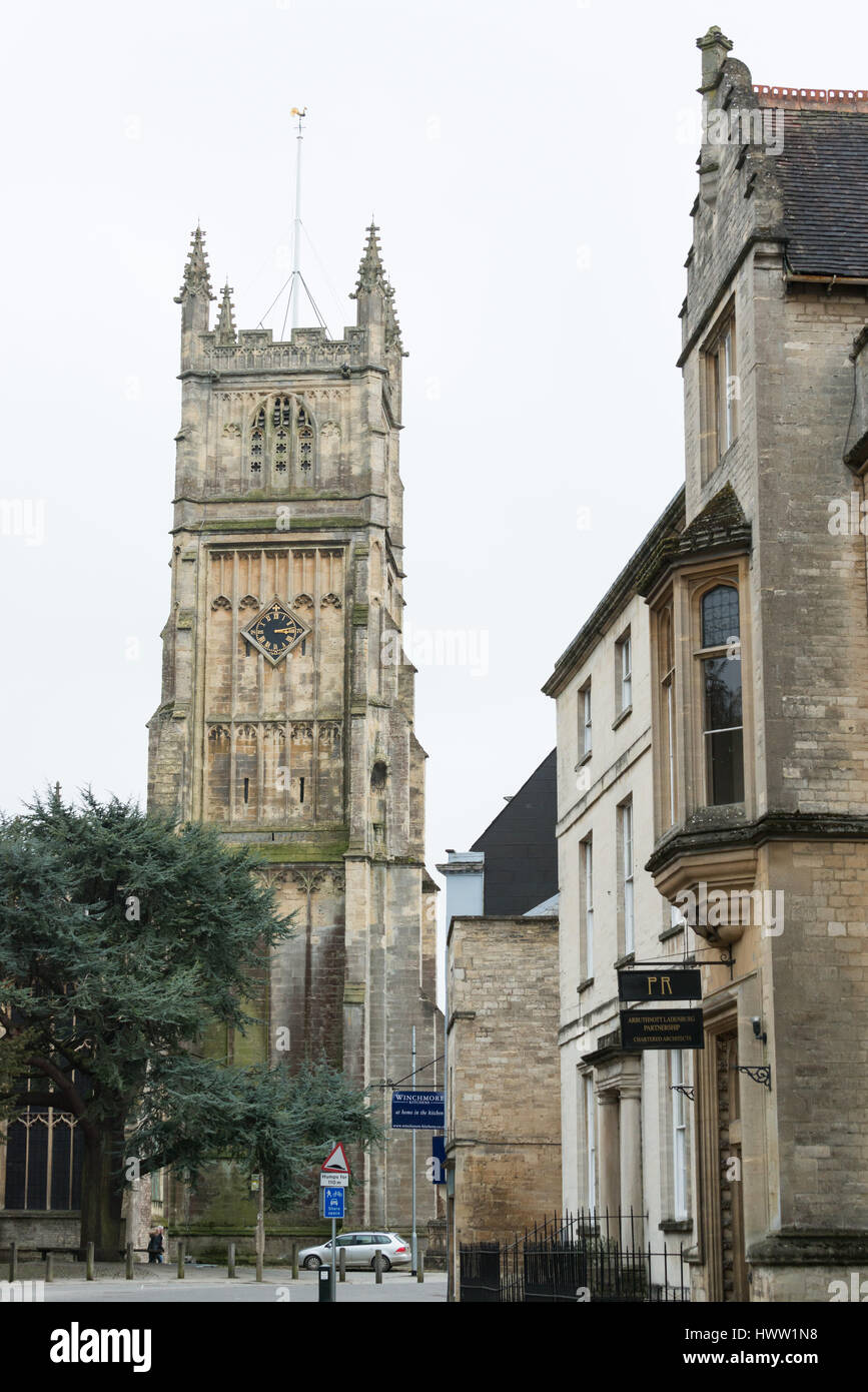 St John the Baptist parish church viewed from Gosditch Street, Cirencester in the Cotswolds, Gloucester, England, UK Stock Photo