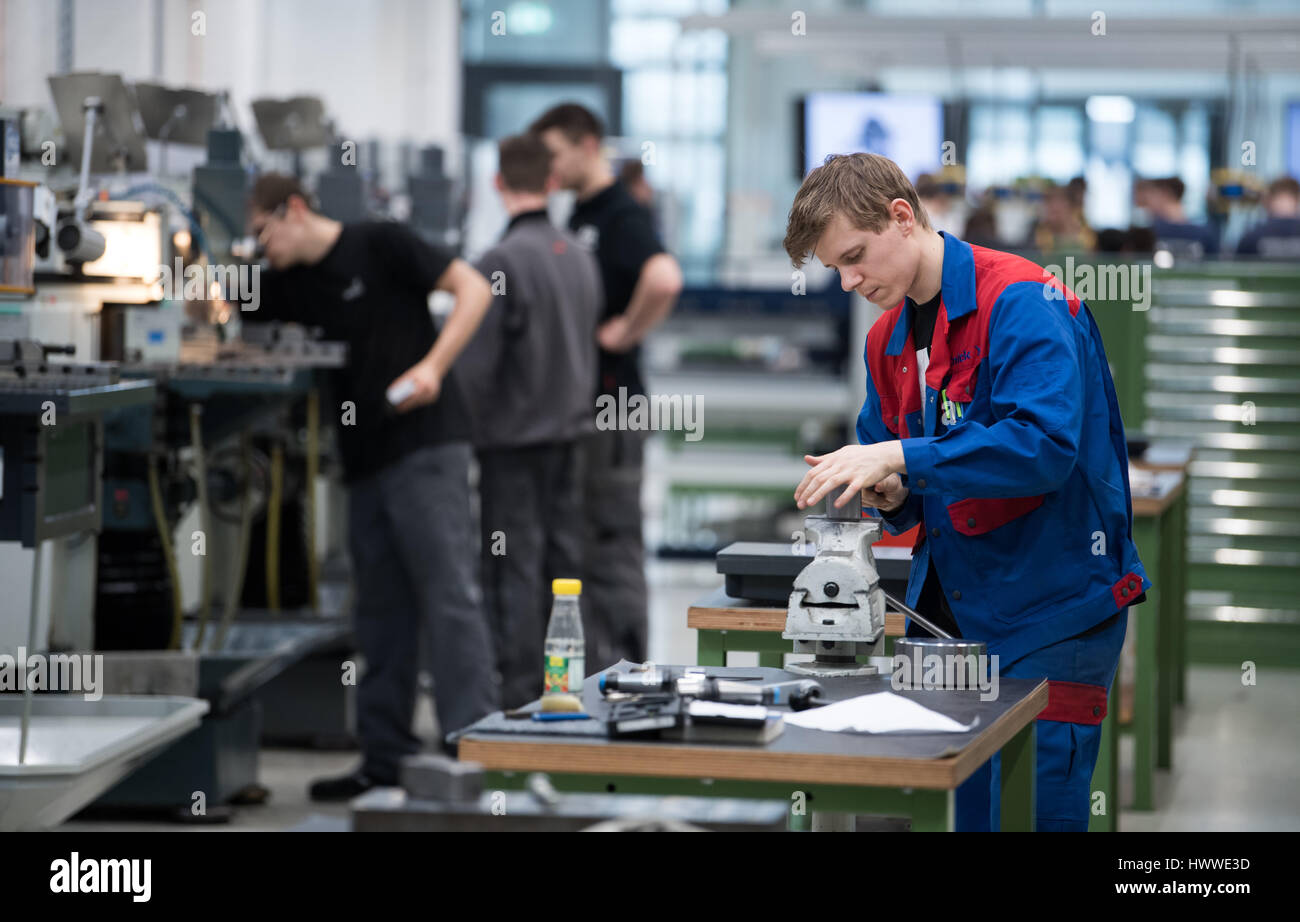 Berlin, Germany. 23rd Mar, 2017. Young apprentices work at an ...