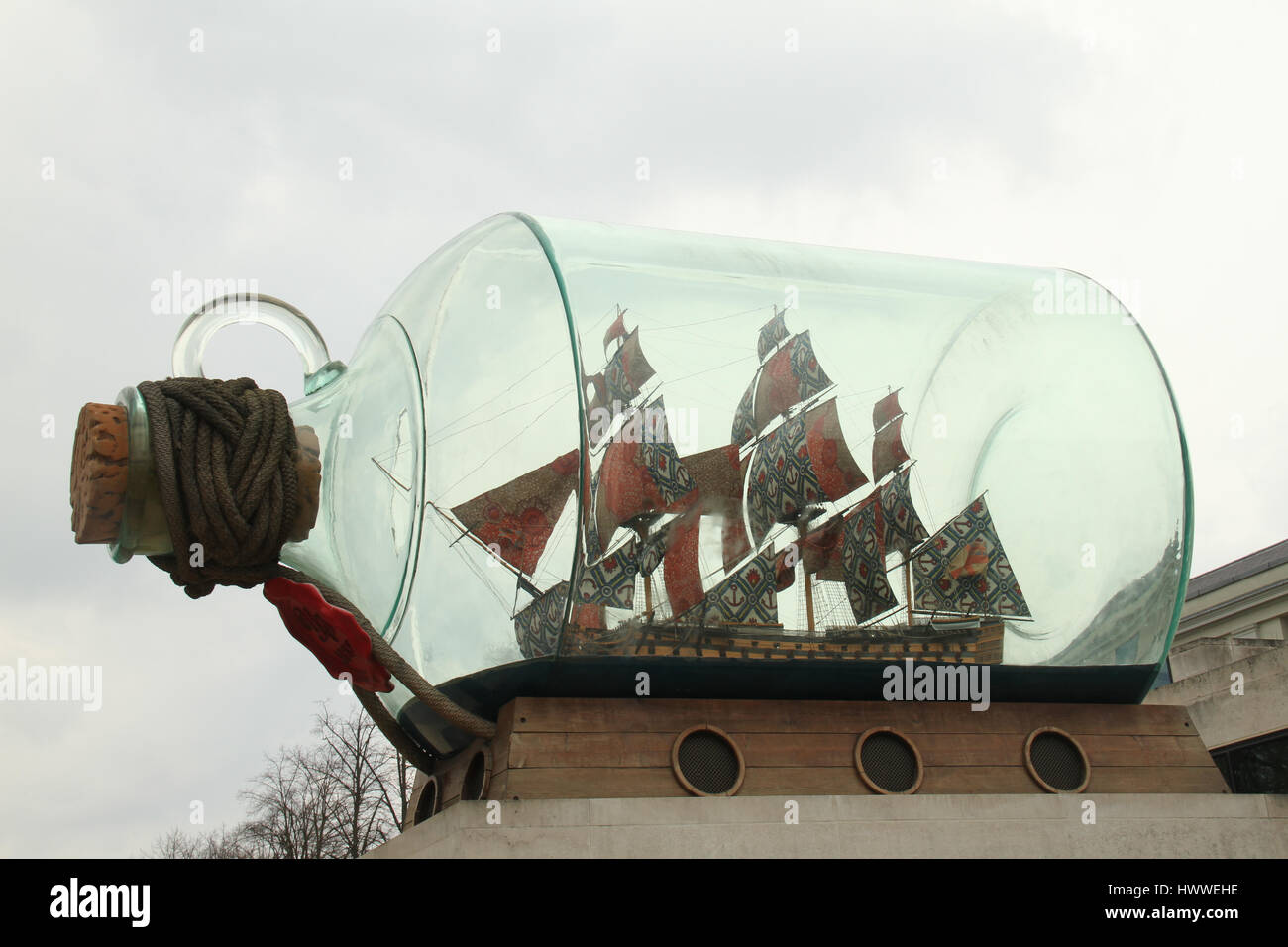 London, UK. 23rd Mar, 2017. Yinka Shonibare's replica of Nelson's HMS Victory in a bottle mounted on a plinth by the Royal Greenwich Park. Greenwich Park hosts the Prime Meridian Line and Royal Observatory as well as being part of the Greenwich Maritime World Heritage Site which is home to The National Maritime Museum and Old Royal Naval College. Credit: David Mbiyu/Alamy Live News Stock Photo