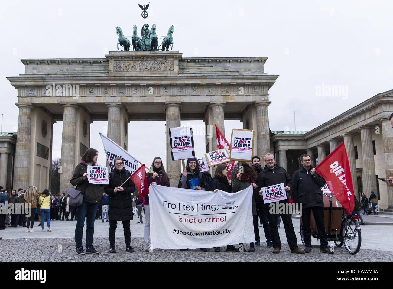 Berlin, Berlin, Germany. 23rd Mar, 2017. Left youth organizations rally under the slogan 'Stop the repression in Ireland! #JobstownNotGuilty 'in front of the Brandenburg Gate. In November 2014, in the course of a protest action against the introduction of water charges, the car of the former deputy Prime Minister JOAN BURTON was blocked by a seat blockade. The Irish state now goes to court against some of the activists, among them the left-wing parliamentary PAUL MURPHY. Credit: Jan Scheunert/ZUMA Wire/Alamy Live News Stock Photo