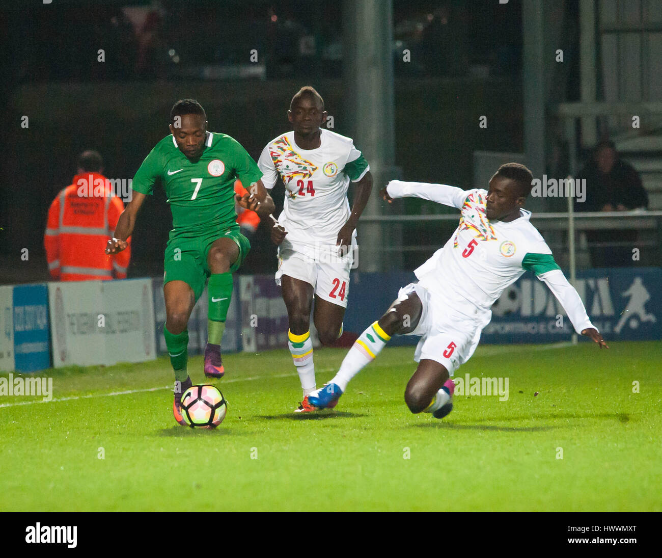 The Hive, Barnet,  England. 23rd March 2017. Ahmed Musa of Nigeria (L) battles for the ball with Adama Mbengue & Idrissa Gana Gueye of Senegal during the International Friendly match between Nigeria and Senegal. Michael Tubi / Alamy Live News Stock Photo