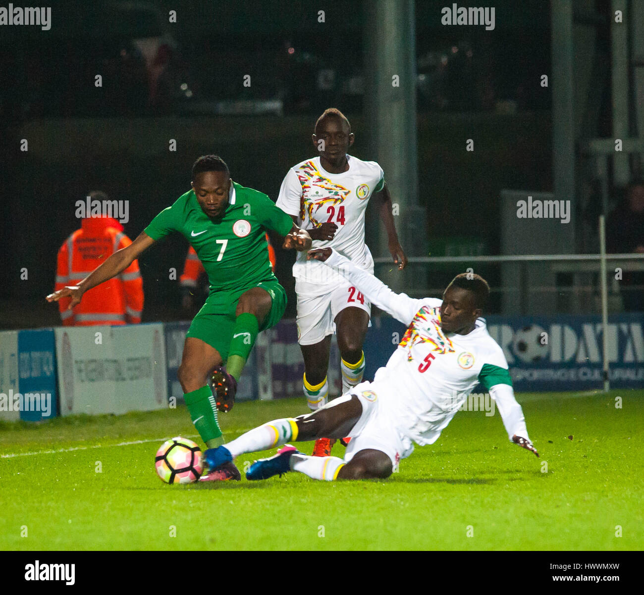 The Hive, Barnet,  England. 23rd March 2017. Ahmed Musa of Nigeria (L) battles for the ball with Adama Mbengue & Idrissa Gana Gueye of Senegal during the International Friendly match between Nigeria and Senegal. Michael Tubi / Alamy Live News Stock Photo