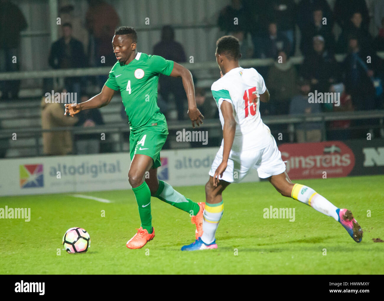 The Hive, Barnet,  England. 23rd March 2017. Kenneth Omeruo of Nigeria  battles for the ball with Opa Nguette of Senegal during the International Friendly match between Nigeria and Senegal. Michael Tubi / Alamy Live News Stock Photo