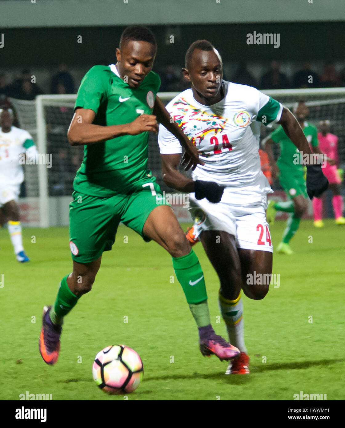 The Hive, Barnet,  England. 23rd March 2017. Ahmed Musa of Nigeria battles for the ball with Adama Mbengue of Senegal during the International Friendly match between Nigeria and Senegal. Michael Tubi / Alamy Live News Stock Photo