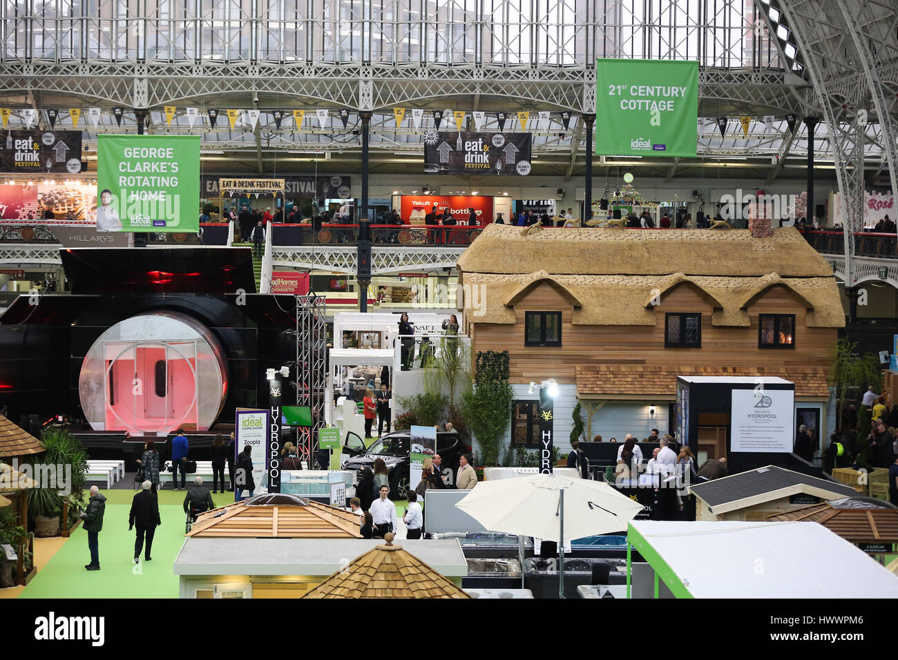 Olympia London, UK. 24th Mar, 2017. Show Homes - George Clarke's Rotating Home (on left) and 21st Century Cottage (on right). The Britain's biggest annual consumer home event sponsored by Zoopla, dating back to 1908, when it was first launched at Olympia. The UK's most famous home show will be welcoming visitors from 24 March - 9 April. Credit: Dinendra Haria/Alamy Live News Stock Photo