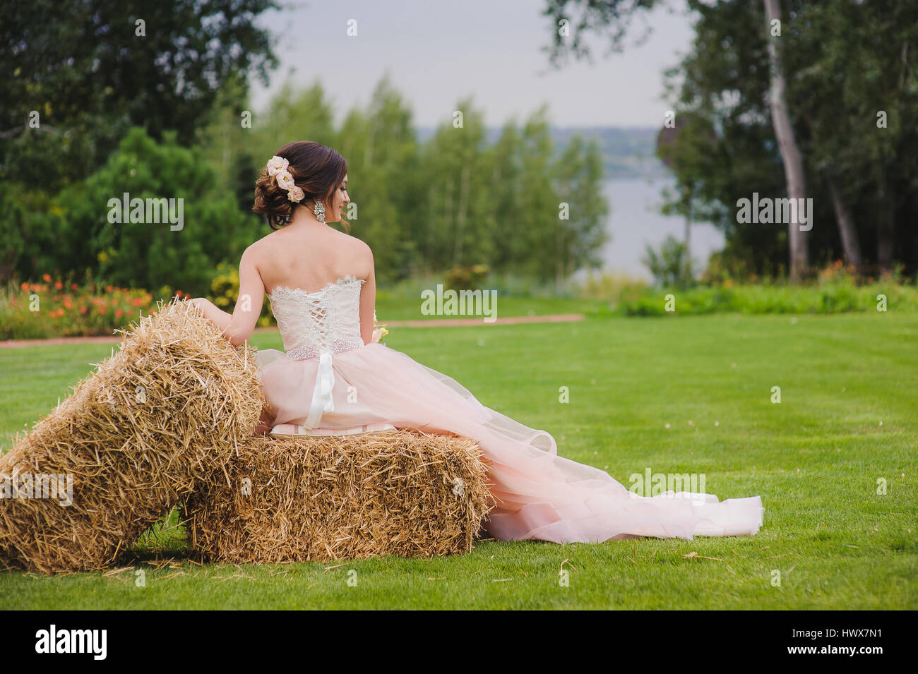 Portrait of a beautiful bride in park Stock Photo